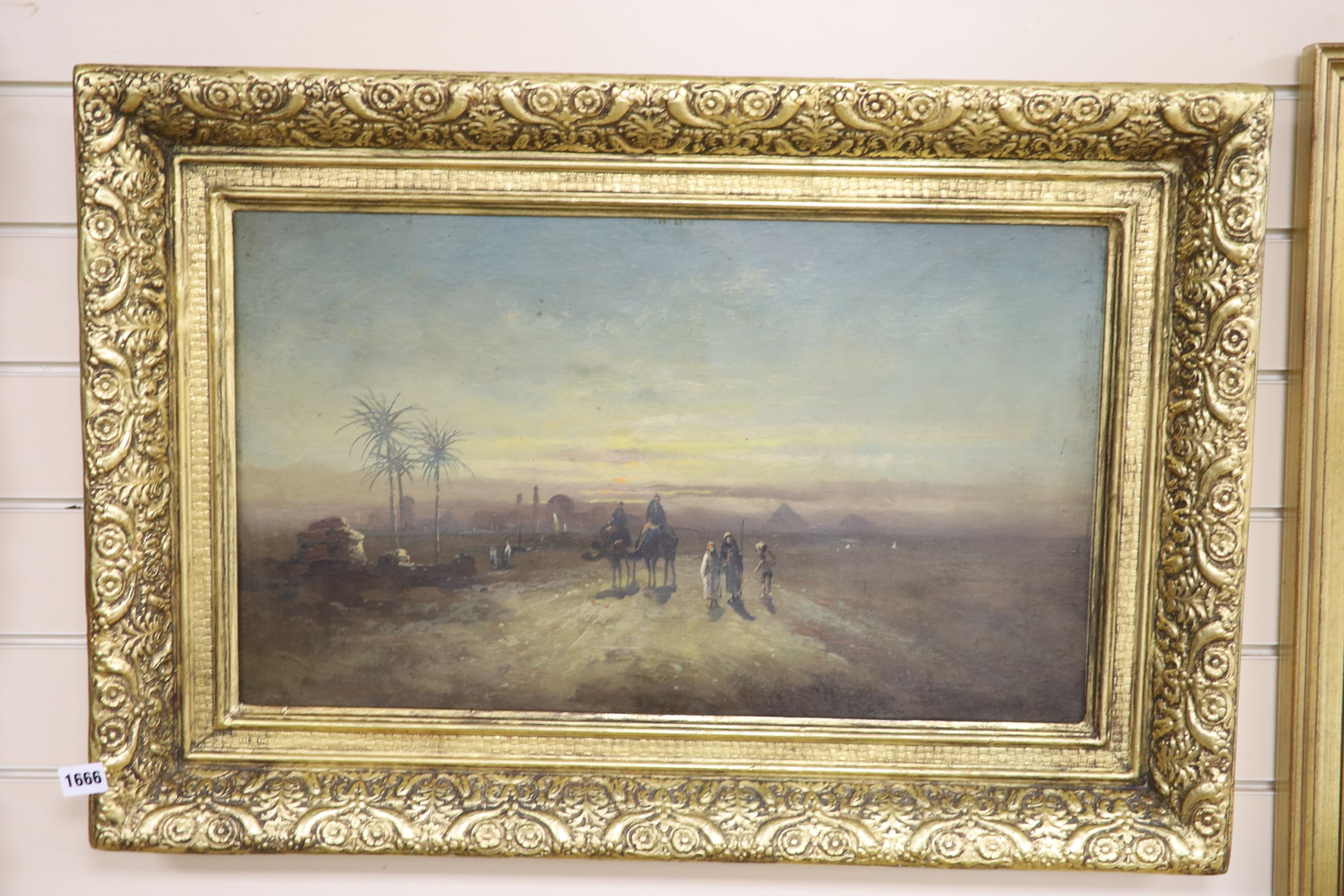 A. Clayton, oil on board, Egyptian landscape with pyramids in the distance, 35 x 61cm